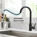 Modern black kitchen faucet with 45cm stretchable pull-out sprayer in use over a sink, showcasing sleek design and functionality.