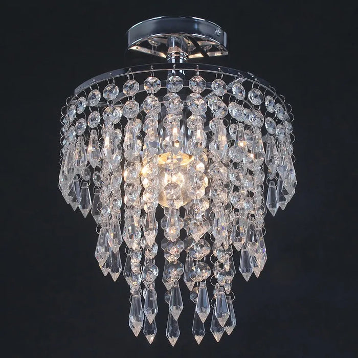 Three-tier crystal ceiling chandelier with LED bulb, featuring plated stainless steel and elegant, cascading crystal design.