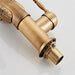 Luxury Swan Basin Mixer in brass finish showing ceramic valve core and sleek design for precise water control.