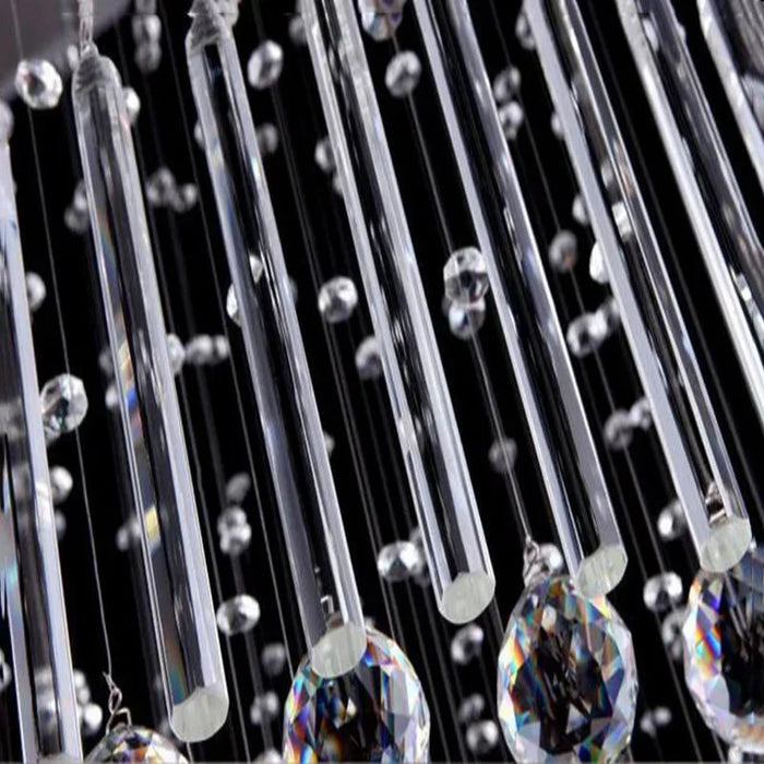 Close-up of sparkling crystals on the Grand Spiral Crystal Chandelier with modern luxury design.