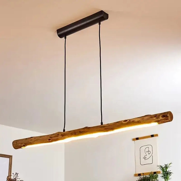 Rustic wooden LED pendant light with adjustable cord, perfect for enhancing modern interiors with warm, energy-efficient lighting.