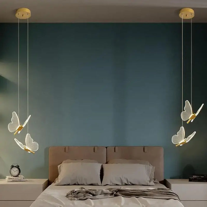 Rotating Butterfly LED Ceiling Chandelier illuminating a bedroom with a modern design and warm ambiance.