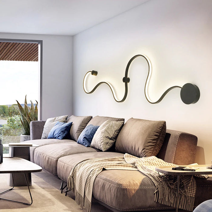 Modern Nordic Curve Wall Lamp in stylish living room setting with elegant sofa and natural light.