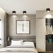 Modern bedroom with wood grain LED ceiling downlights illuminating stylish decor.