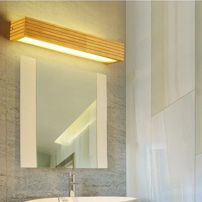 Elegant wood LED wall lamp above bathroom mirror, modern design with adjustable up & down lighting, CE and ROHS certified.