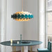 Vibrant Retro Circular Chandelier with colorful disk design hanging above a modern dining table in a stylish room.