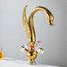 Gold Swan Basin Faucet with elegant swan design, solid brass construction, and 360-degree rotation for bathroom luxury and functionality.