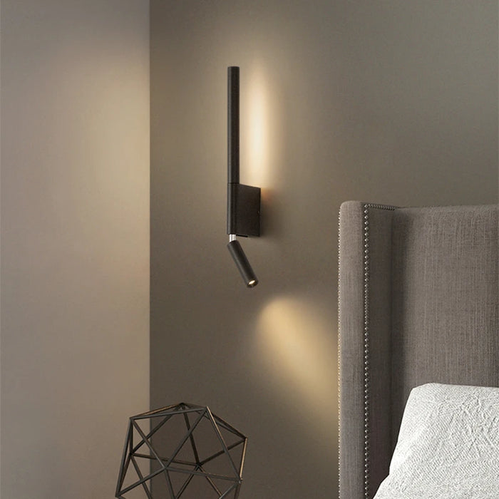 Adjustable modern bedside wall lamp with LED light, mounted for reading, providing energy-efficient illumination and sleek design.