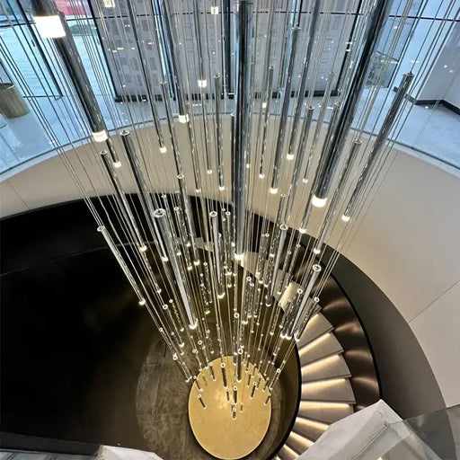 Minimalist circular LED tube chandelier over spiral staircase, showcasing modern luxury and adaptability for various spaces.