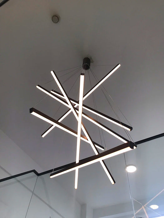 Modern smart chandelier with remote-controlled, dimmable LED lights in geometric design for versatile spaces.