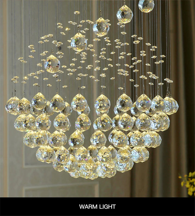 Warm light LED spiral crystal chandelier with elegant design.