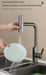 Hydroelectric Kitchen Faucet with LED display washing dish, showcasing pressurized blade water and three water outlet modes.