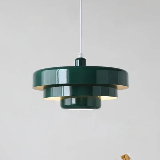 Dark green Danish Modern LED pendant light with sleek, architectural design, perfect for small spaces.