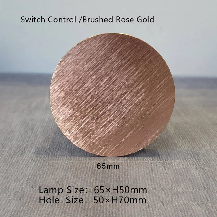 Brushed rose gold switch control with dimensions 65xH50mm, hole size 50xH70mm, on a textured surface.