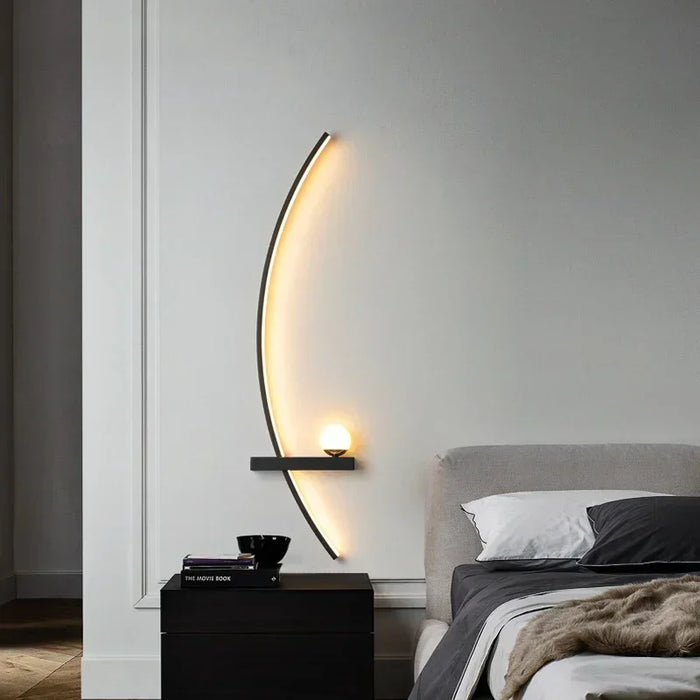 Elegant line wall light with LED illumination mounted beside contemporary bed setup in modern bedroom.