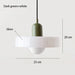 Retro glass pendant light in dark green and white with dimensions 20 cm by 25 cm, featuring elegant glass design.