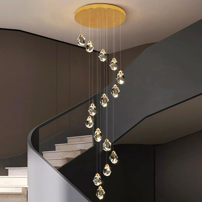 Luxury Crystal Dropping Stones Chandelier with cascading lights in modern stairwell.