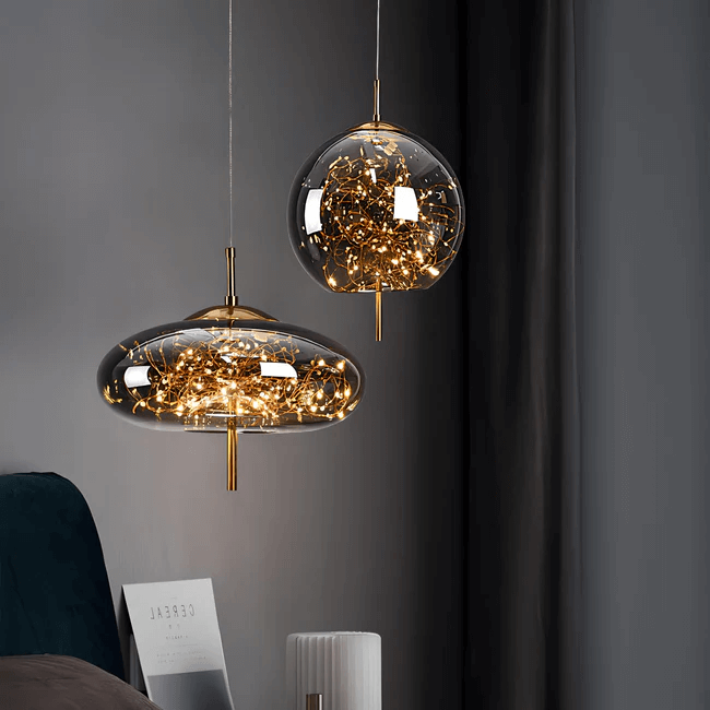 Starburst Glass Dome Pendant Ceiling Light with golden burst effect, illuminating a modern interior setting.