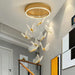 Rotating Butterfly LED Ceiling Chandelier with acrylic butterflies, ideal for bedrooms and foyers.