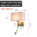 Modern bedside wall lamp with copper body, beige lampshade, USB port, and spotlight. Dimensions: 28cm x 14cm, 52cm height.