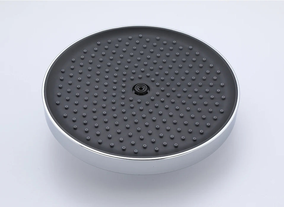 Modern round showerhead with sleek design suitable for luxury shower systems and rainfall experiences.