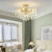 Luxury crystal lantern chandelier illuminating a modern bedroom with elegant design.