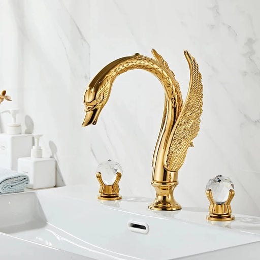 Luxury Swan Basin Mixer with Gold Finish and Crystal Handles on White Sink