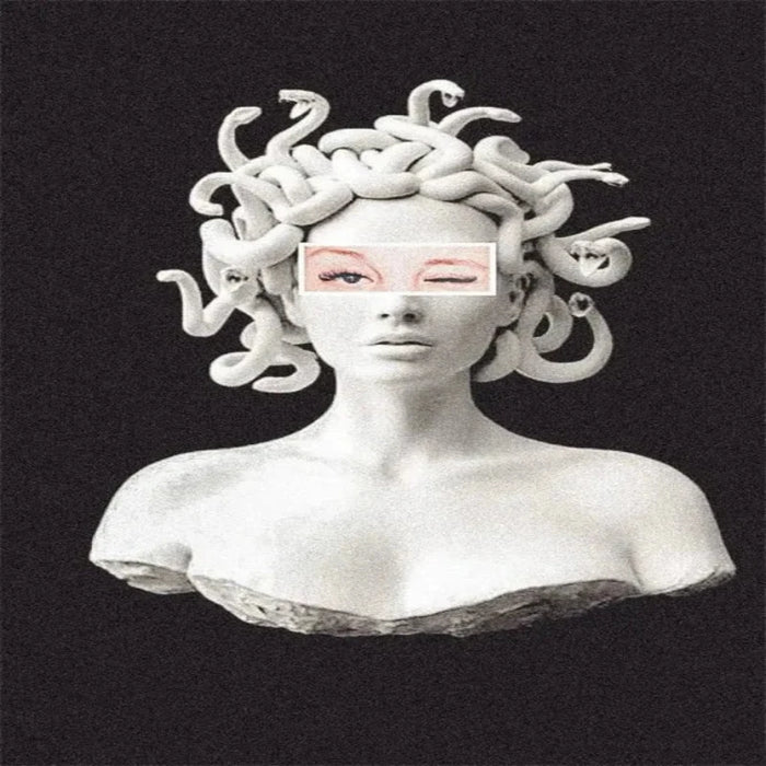 Medusa statue art with snakes for hair on black background, embodying Greek mythology themes.