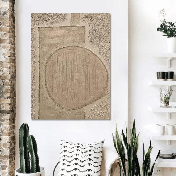 Earthen Tones Abstract Texture Art hanging on a white wall, surrounded by plants, showcasing earthy browns and intricate textures.