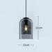 Minimalist Nordic glass pendant light with sleek design, measuring 15cm diameter and 22cm height, featuring an E14 LED bulb.