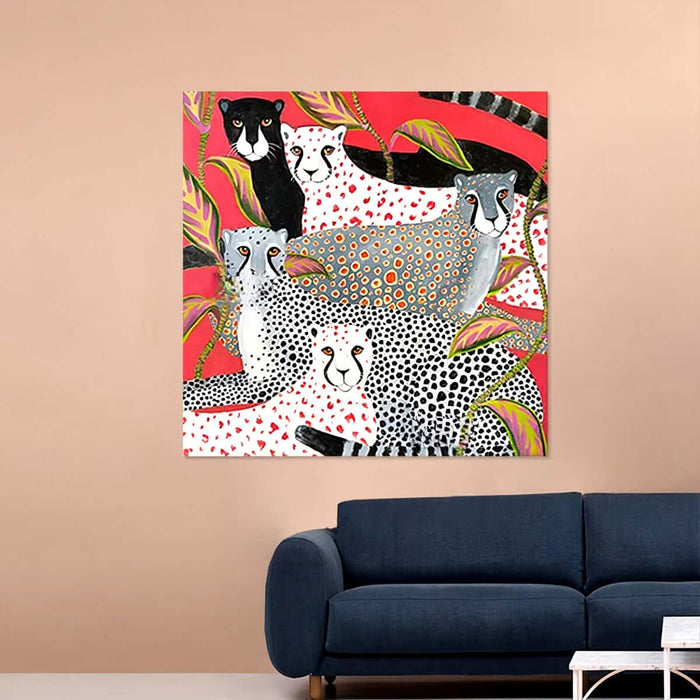 Abstract Leopard Canvas Art Print with colorful patterns on a wall above a blue sofa.